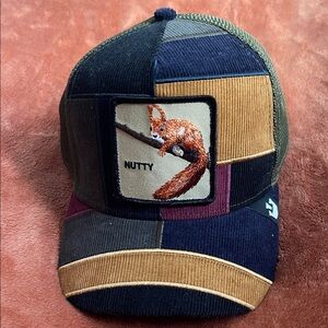 Goorin Bros Nutty Patchwork Cap in Black, Brown, and Tan